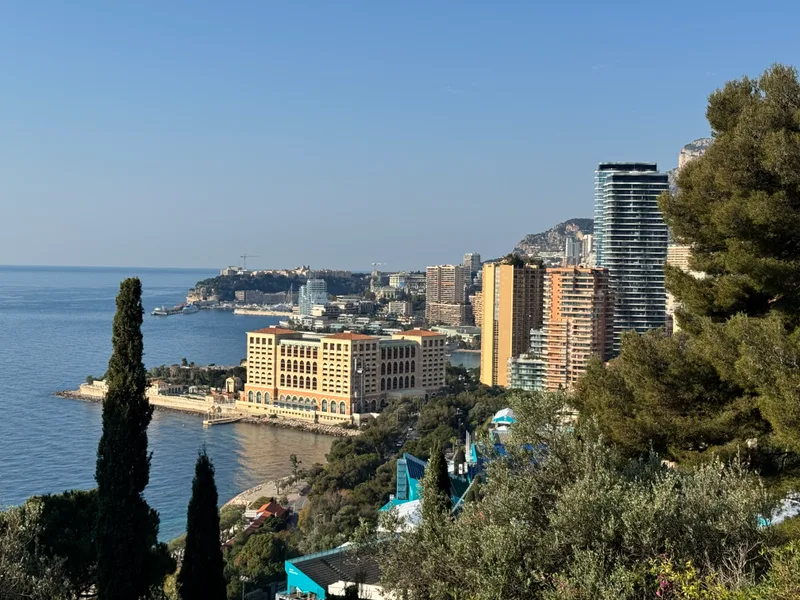 Sweeping daytime panorama of Monaco from Avenue de Varavilla showing the harbour, the Rock of Monaco, and the Monte-Carlo skyline under Mediterranean sun